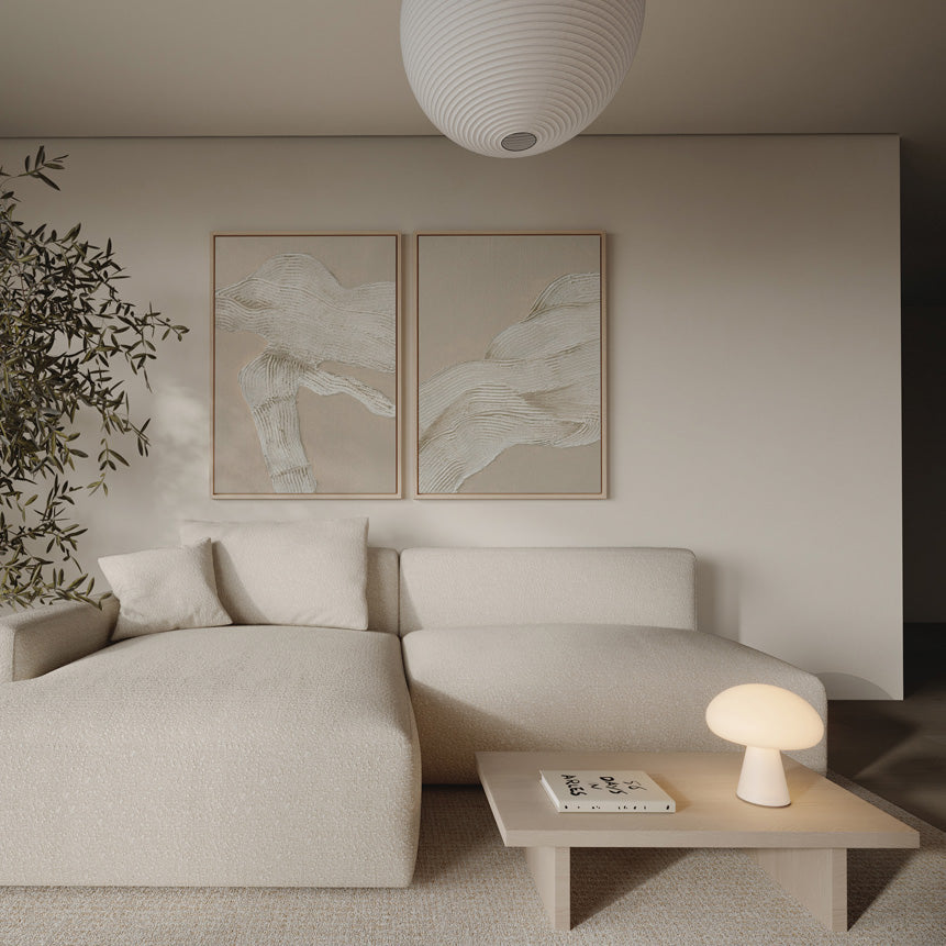 Minimalist Japandi wall art in soft neutral tones styled in a modern living room with natural textures and warm timber accents