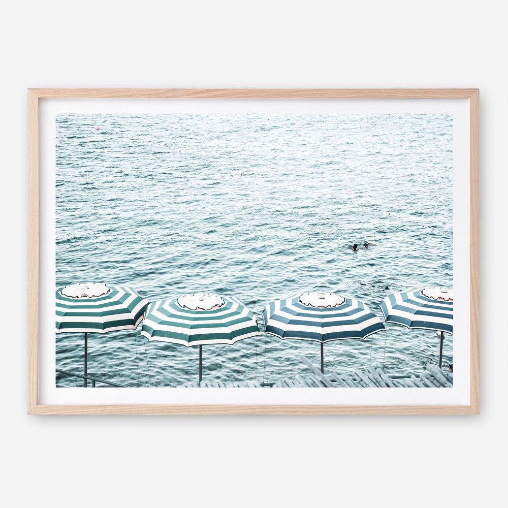 Shop Capri Island Umbrellas Photo Art Print a coastal themed photography wall art print from The Print Emporium wall artwork collection - Buy Australian made fine art poster and framed prints for the home and your interior decor, TPE-872-AP