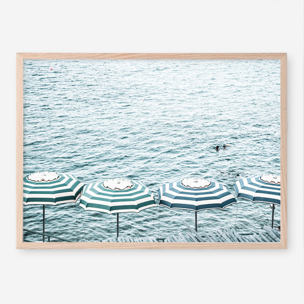 Shop Capri Island Umbrellas Photo Art Print a coastal themed photography wall art print from The Print Emporium wall artwork collection - Buy Australian made fine art poster and framed prints for the home and your interior decor, TPE-872-AP