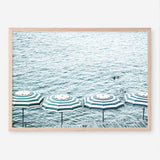Shop Capri Island Umbrellas Photo Art Print a coastal themed photography wall art print from The Print Emporium wall artwork collection - Buy Australian made fine art poster and framed prints for the home and your interior decor, TPE-872-AP