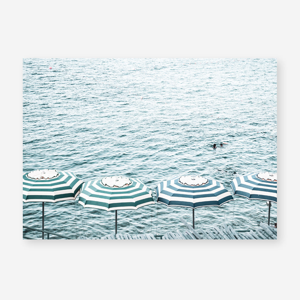 Shop Capri Island Umbrellas Photo Art Print a coastal themed photography wall art print from The Print Emporium wall artwork collection - Buy Australian made fine art poster and framed prints for the home and your interior decor, TPE-872-AP