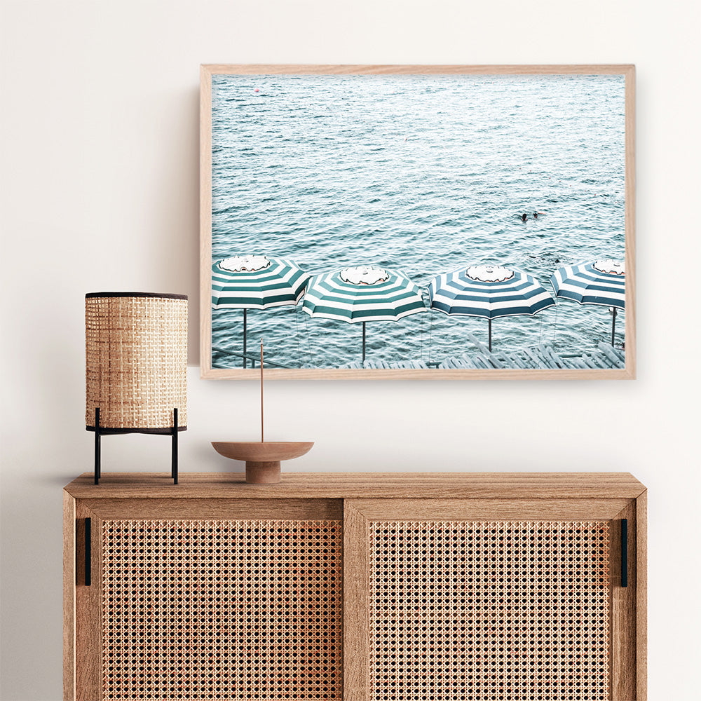 Shop Capri Island Umbrellas Photo Art Print a coastal themed photography wall art print from The Print Emporium wall artwork collection - Buy Australian made fine art poster and framed prints for the home and your interior decor, TPE-872-AP