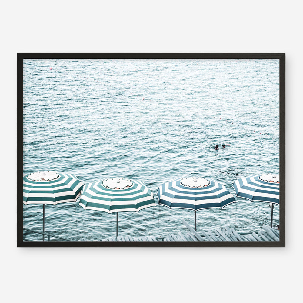 Shop Capri Island Umbrellas Photo Art Print a coastal themed photography wall art print from The Print Emporium wall artwork collection - Buy Australian made fine art poster and framed prints for the home and your interior decor, TPE-872-AP