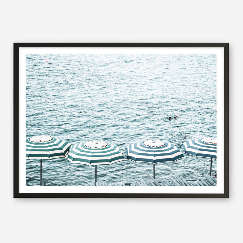 Shop Capri Island Umbrellas Photo Art Print a coastal themed photography wall art print from The Print Emporium wall artwork collection - Buy Australian made fine art poster and framed prints for the home and your interior decor, TPE-872-AP