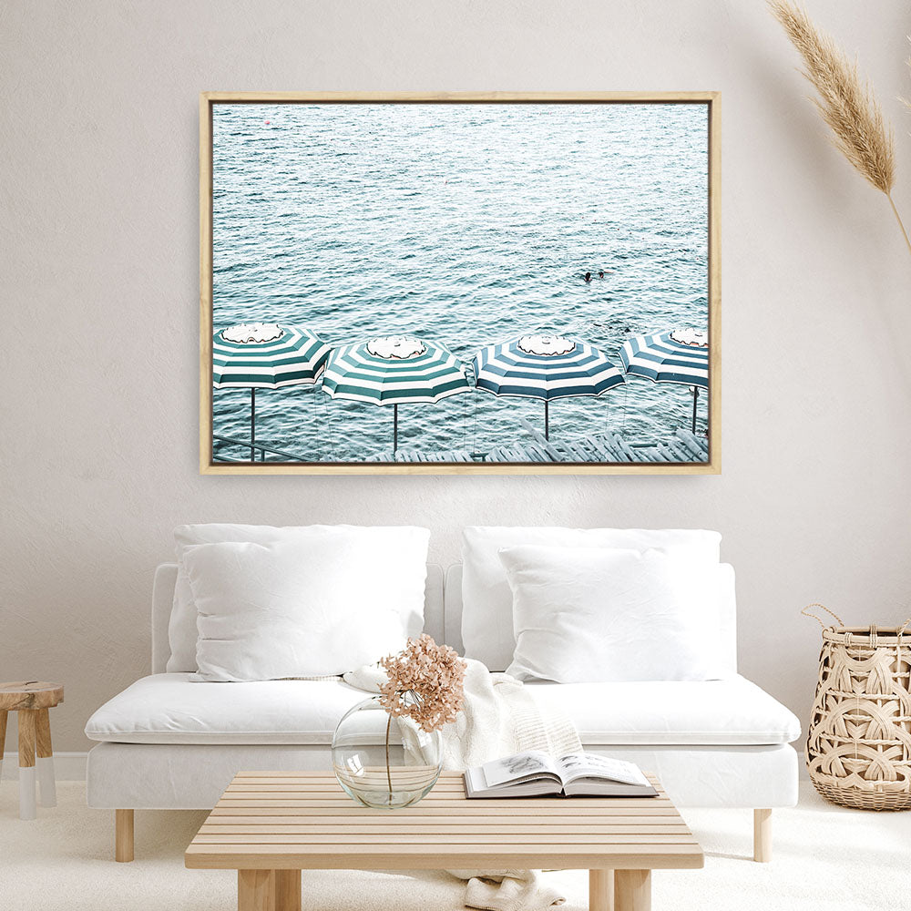 Shop Capri Island Umbrellas Photo Canvas Print a coastal themed photography framed stretched canvas print from The Print Emporium wall artwork collection - Buy Australian made prints for the home and your interior decor space, TPE-872-CA-35X46-NF