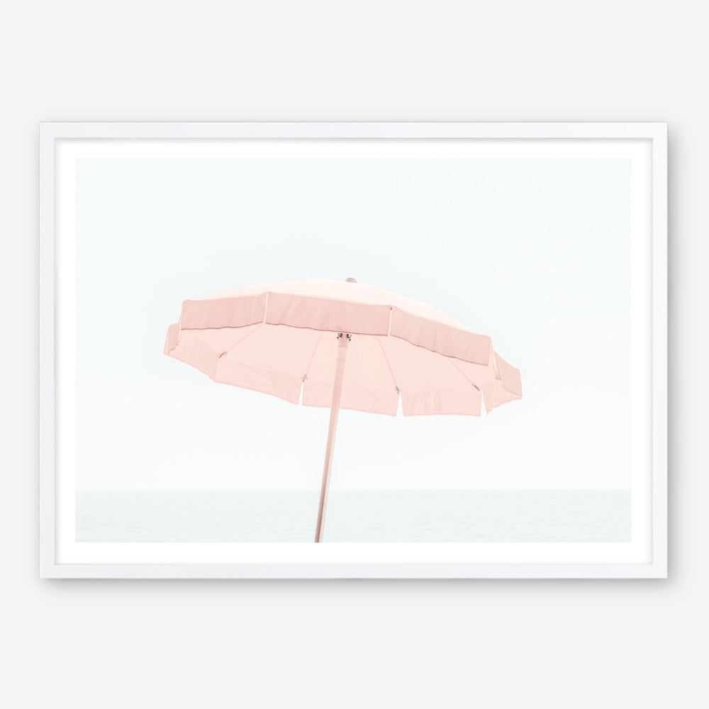 Shop Pink Parasol Photo Art Print a coastal themed photography wall art print from The Print Emporium wall artwork collection - Buy Australian made fine art poster and framed prints for the home and your interior decor, TPE-543-AP
