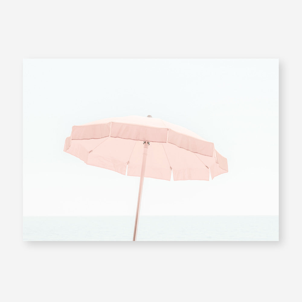 Shop Pink Parasol Photo Art Print a coastal themed photography wall art print from The Print Emporium wall artwork collection - Buy Australian made fine art poster and framed prints for the home and your interior decor, TPE-543-AP