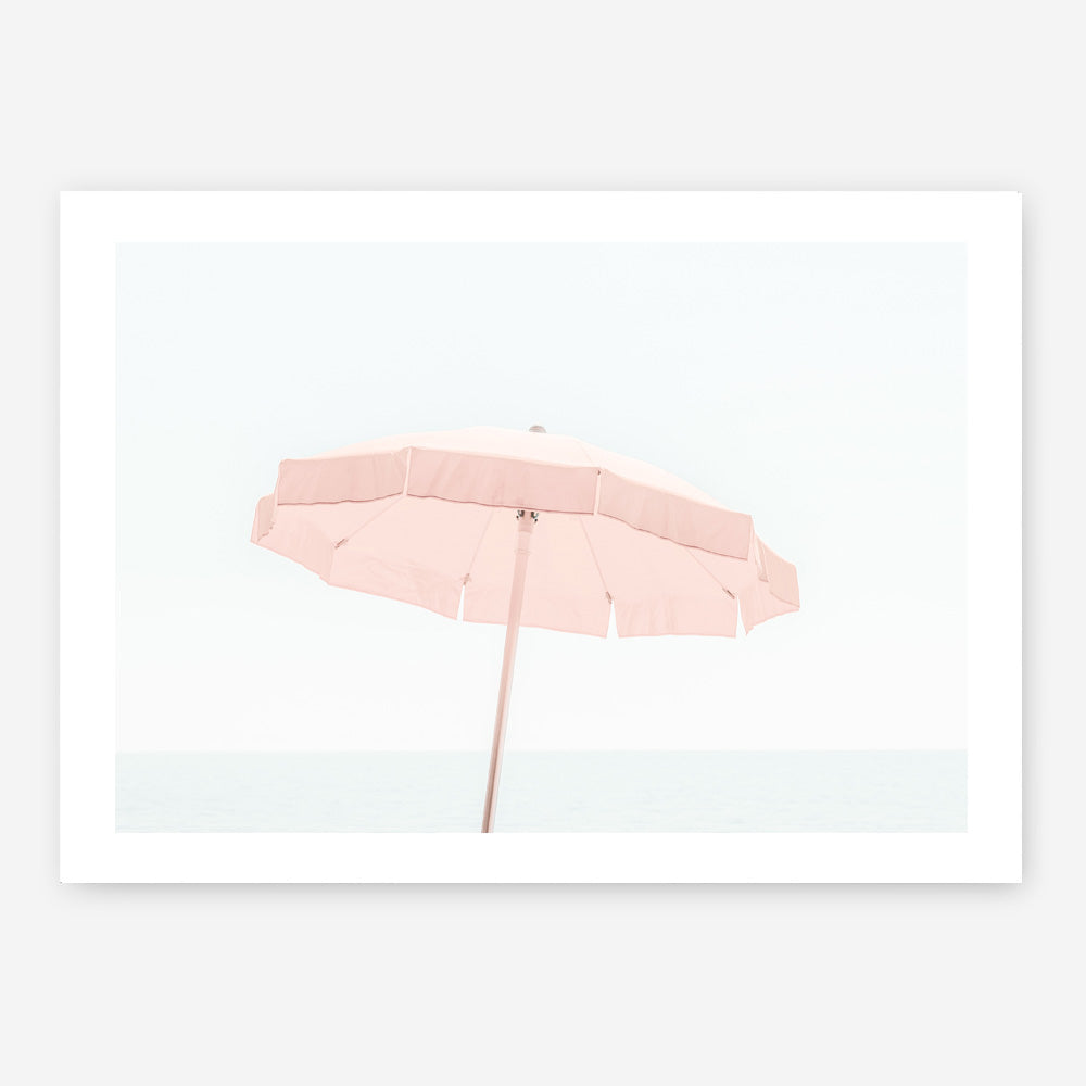 Shop Pink Parasol Photo Art Print a coastal themed photography wall art print from The Print Emporium wall artwork collection - Buy Australian made fine art poster and framed prints for the home and your interior decor, TPE-543-AP