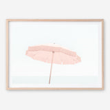 Shop Pink Parasol Photo Art Print a coastal themed photography wall art print from The Print Emporium wall artwork collection - Buy Australian made fine art poster and framed prints for the home and your interior decor, TPE-543-AP