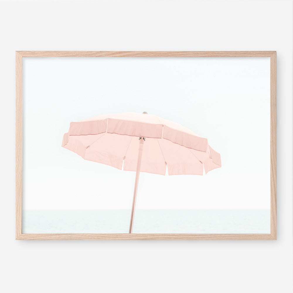 Shop Pink Parasol Photo Art Print a coastal themed photography wall art print from The Print Emporium wall artwork collection - Buy Australian made fine art poster and framed prints for the home and your interior decor, TPE-543-AP