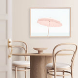 Shop Pink Parasol Photo Art Print a coastal themed photography wall art print from The Print Emporium wall artwork collection - Buy Australian made fine art poster and framed prints for the home and your interior decor, TPE-543-AP